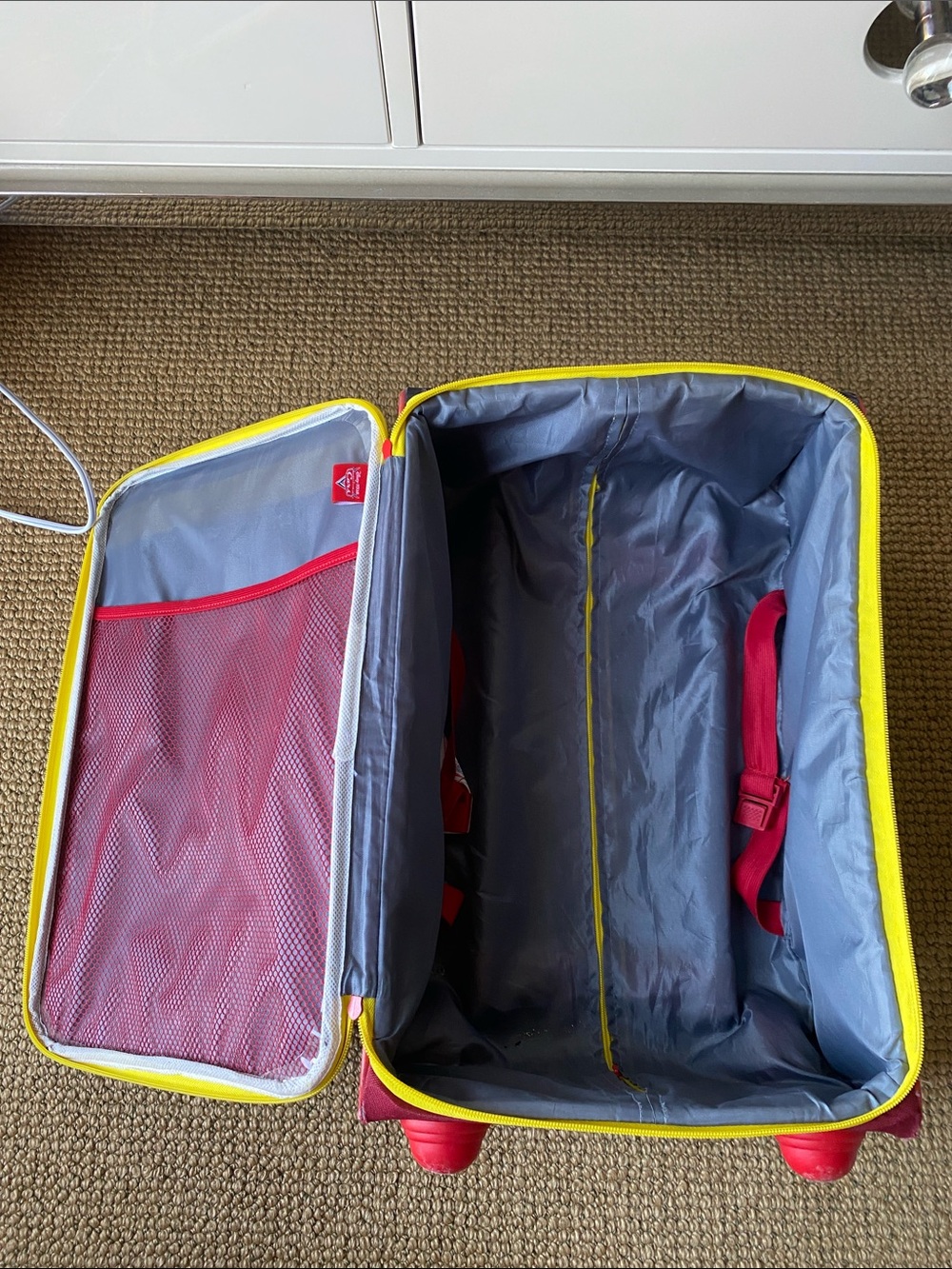 American Tourister Red and Yellow Lightning McQueen Rolling Luggage - Picture 6 of 7